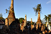 Inle Lake Myanmar. Indein, on the summit of a hill the  Shwe Inn Thein Paya a cluster of hundreds of ancient stupas. Many of them are ruined and overgrown with bushes. 
